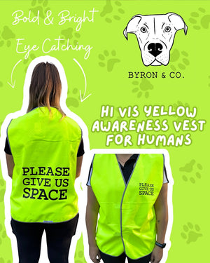 
                  
                    Hi-vis yellow awareness vest for humans with 'Please Give Us Space' text, branded by Byron & Co.
                  
                
