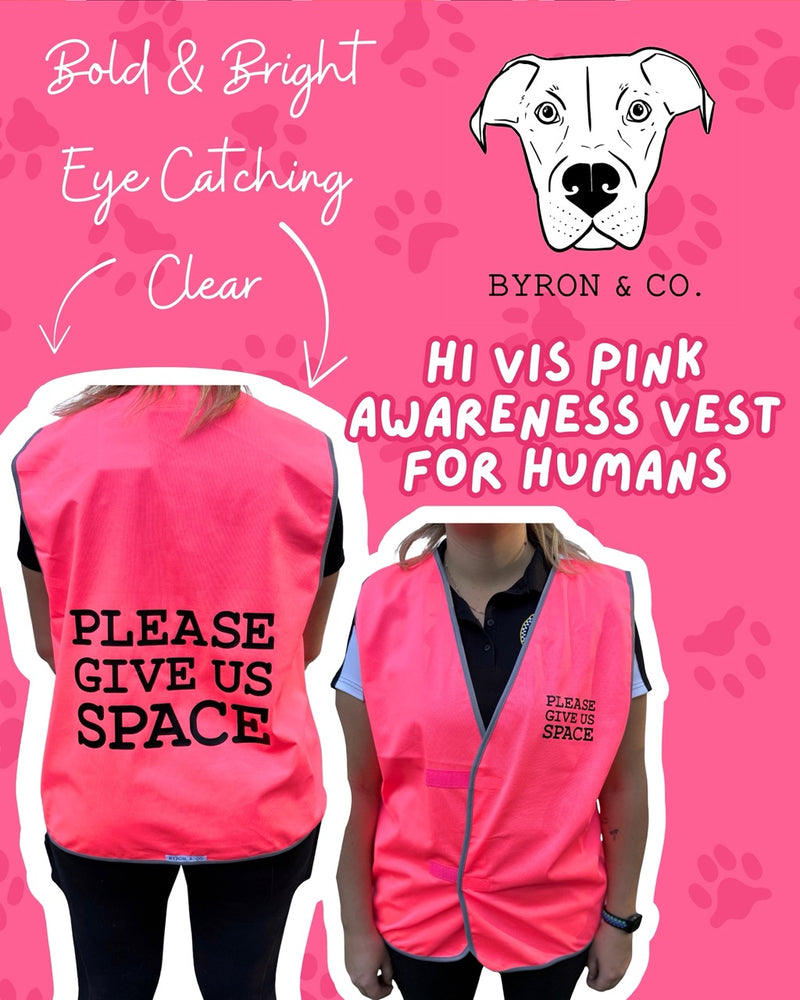 
                  
                    Pink awareness vest for humans with 'Please Give Us Space' text, brand 'Byron & Co.' visible.
                  
                
