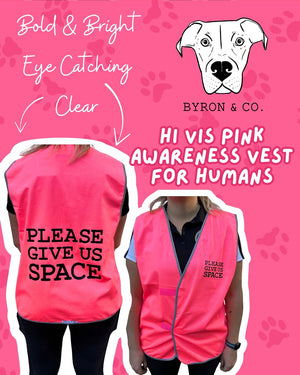 
                  
                    Pink awareness vest for humans with 'Please Give Us Space' text, brand 'Byron & Co.' visible.
                  
                